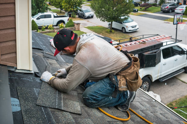 Professional Roofing technician working in Raymond, ME